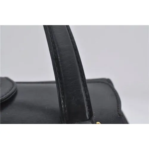 Mod Gucci, black leather shoulder bag with two longer straps, two exterior pockets, a hinged opening, and a gold and bamboo accent clasp